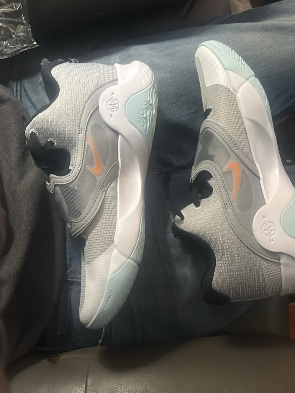 KDs Nike Grey Sneakers with Orange Swoosh and Black Accents